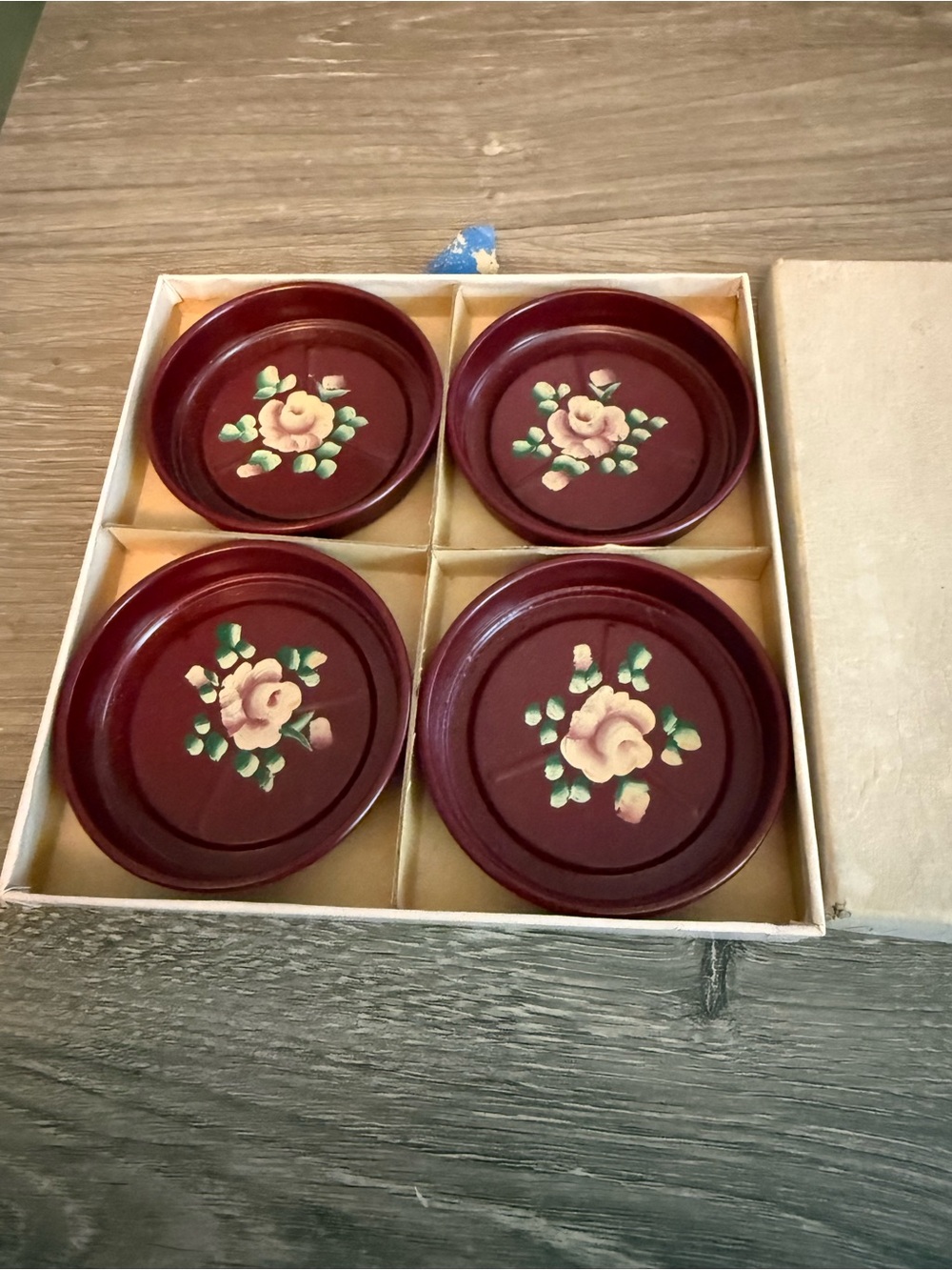 4 vintage Nashco hand-painted floral coasters in toleware lacquerware